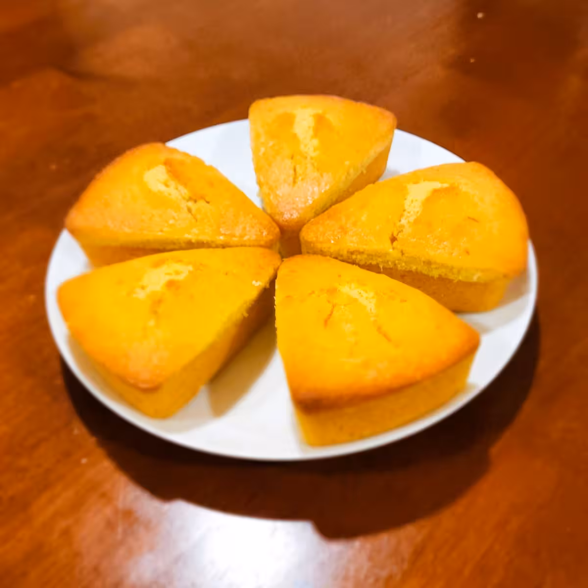Sweet and fluffy buttermilk cornbread slices on a plate