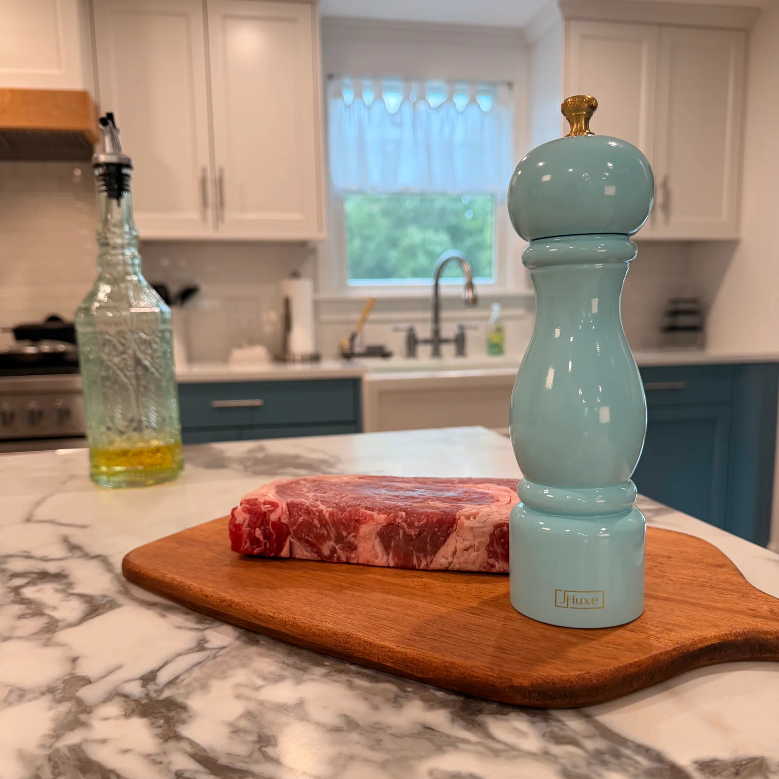 Raw steak ready for seasoning on a cutting board in the Kitchen Affliction kitchen